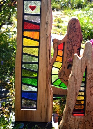 stained glas and wood sculptures